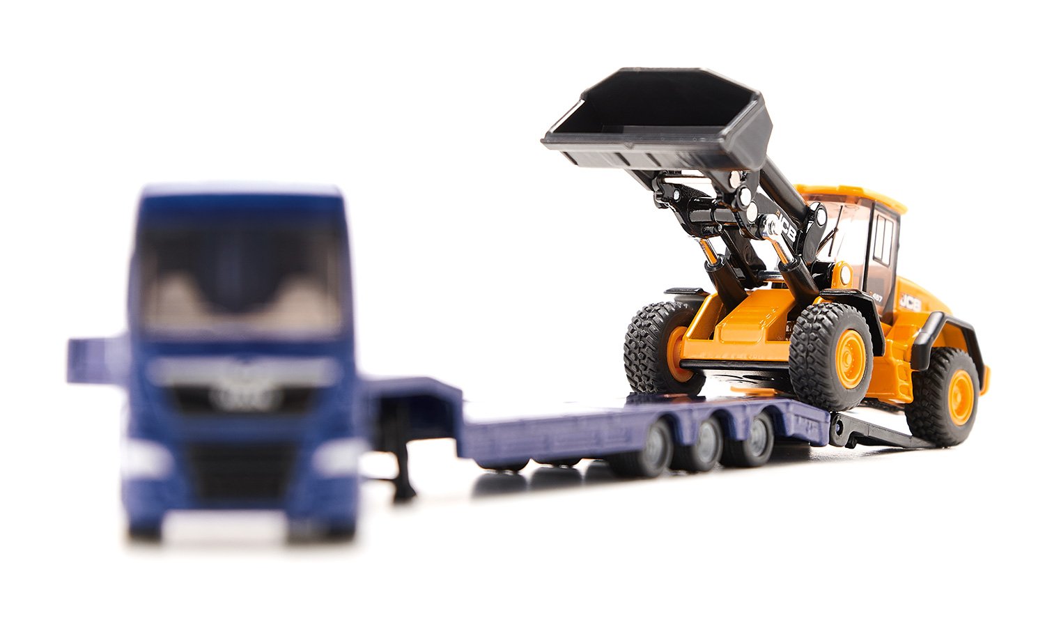 MAN truck with low loader and JCB wheel loader | 10179000000