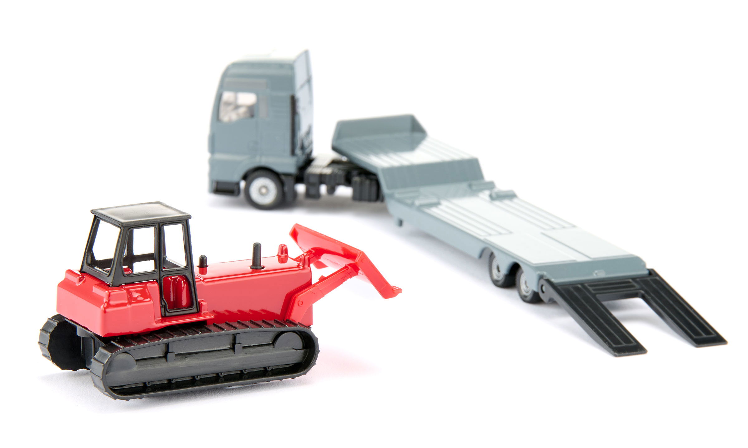 MAN Lkw mit Planierraupe