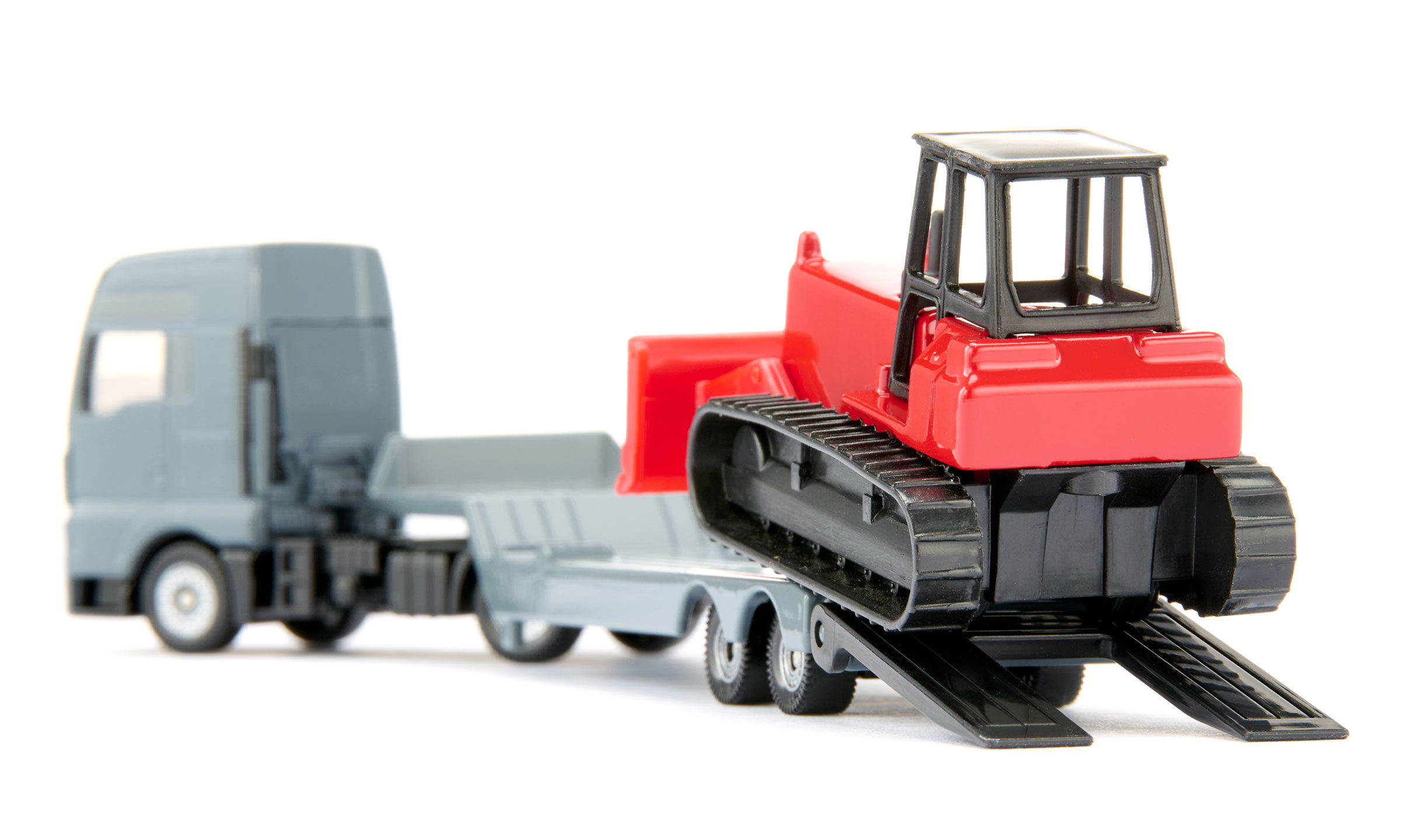 MAN Lkw mit Planierraupe
